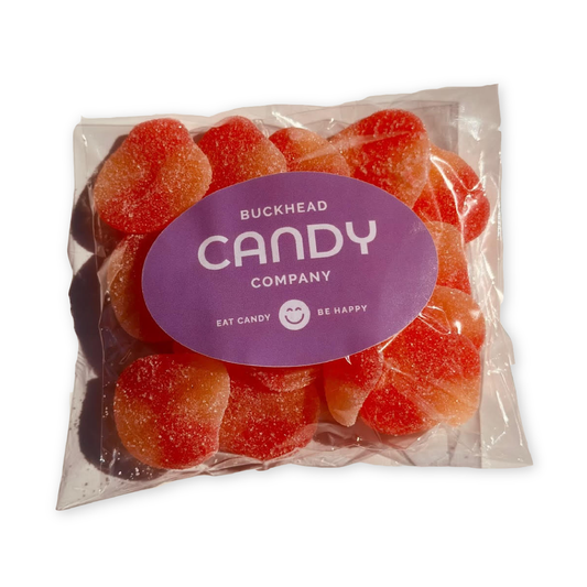 4 ounce bag of sour peach gummi candy with Buckhead Candy Company branding